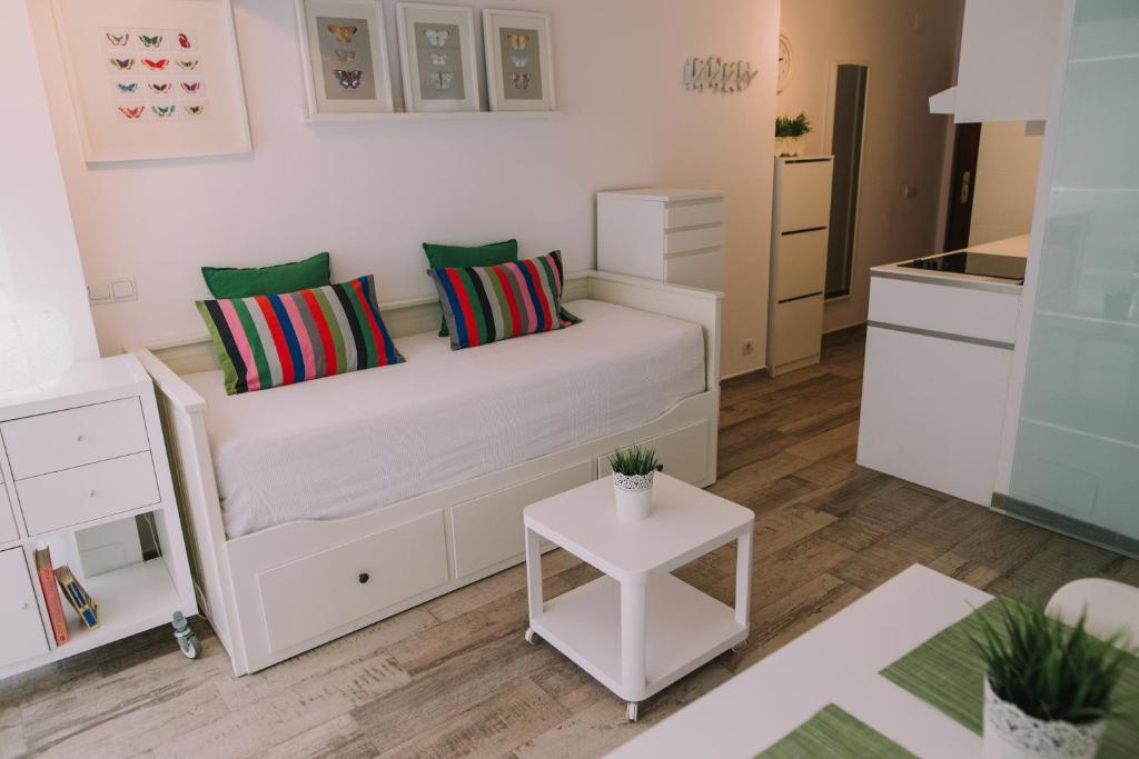 Posteľ alebo postele v izbe v ubytovaní Apartamento Malagueta Playa