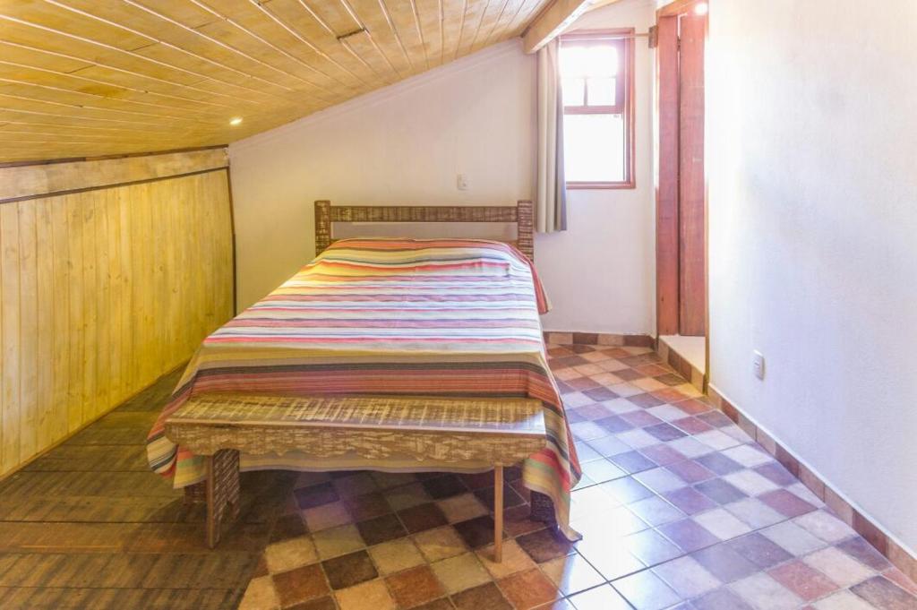 Postel nebo postele na pokoji v ubytování Pouso copo de leite