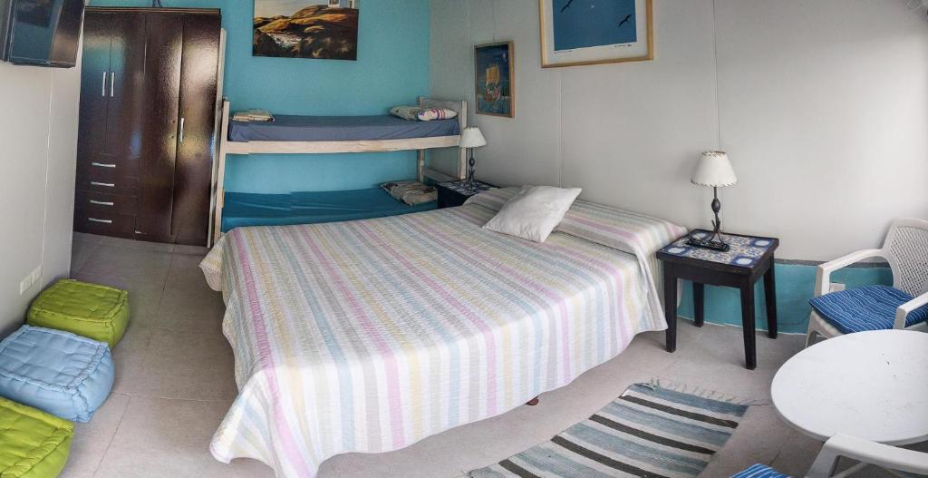 Postel nebo postele na pokoji v ubytování Suites Atlantis