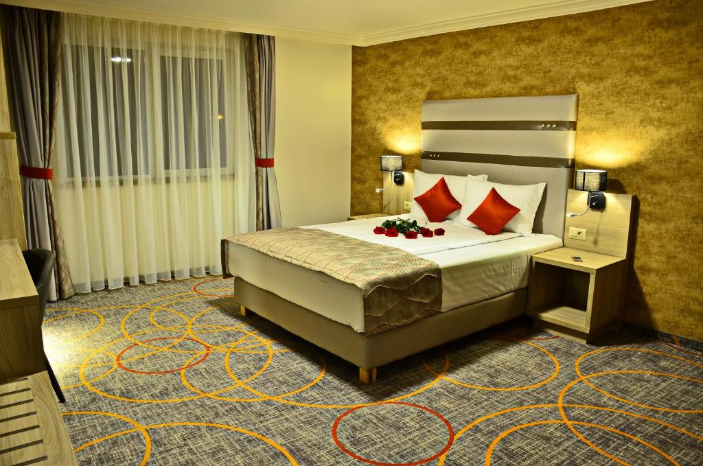 Postel nebo postele na pokoji v ubytování Hotel Baril
