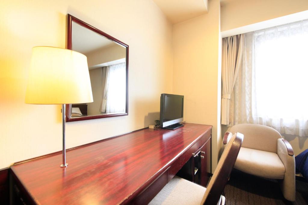 TV a/nebo společenská místnost v ubytování Quintessa Hotel Ogaki