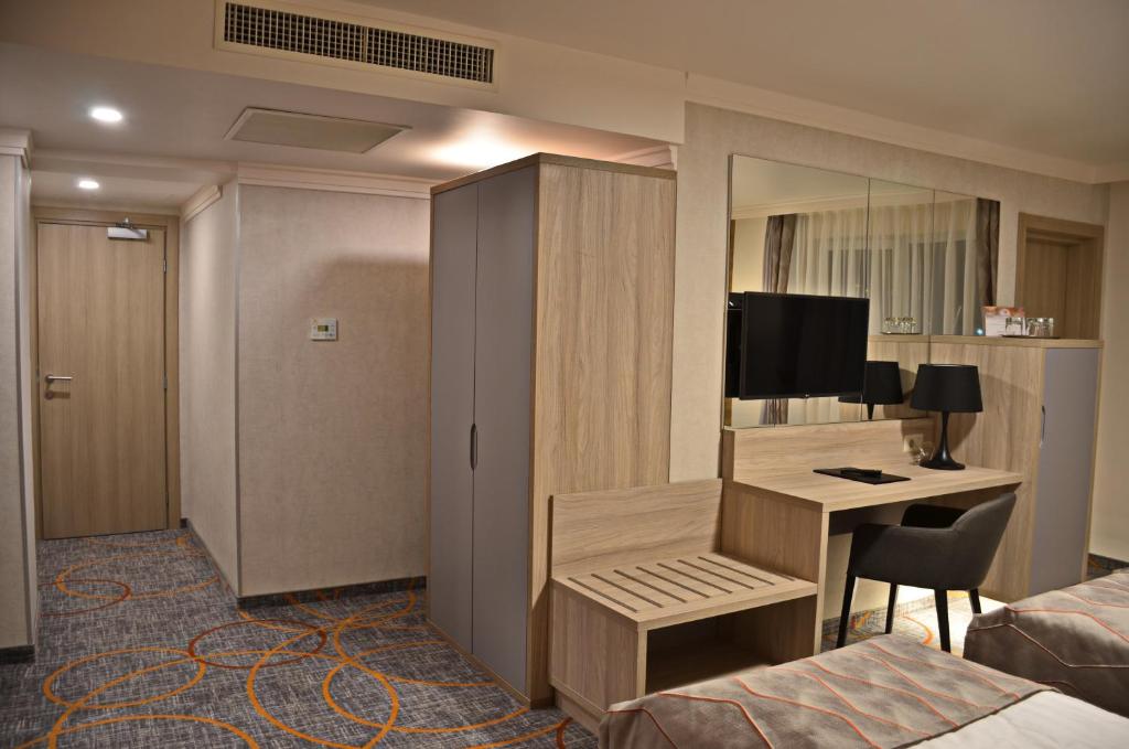 TV a/nebo společenská místnost v ubytování Hotel Baril