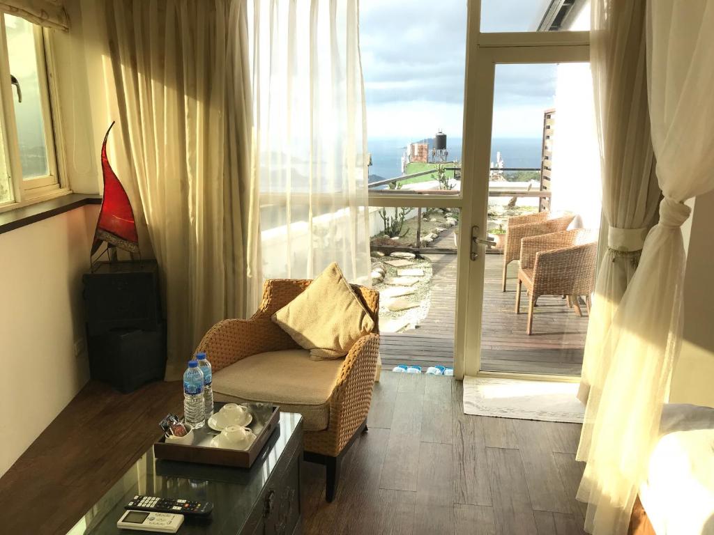 Posezení v ubytování Chiu Chunt Dint B&B