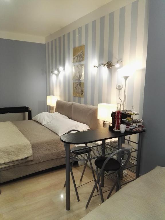 Postel nebo postele na pokoji v ubytování B&B Pescara Centro Luxury Suite