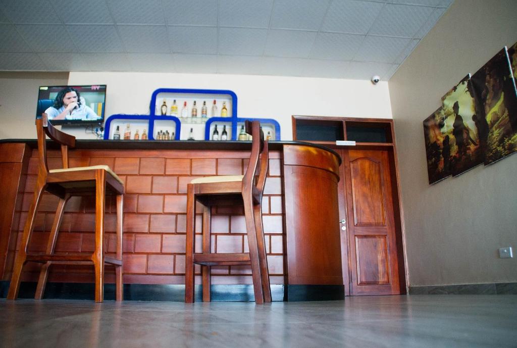 TV a/nebo společenská místnost v ubytování Kenendia Hotel