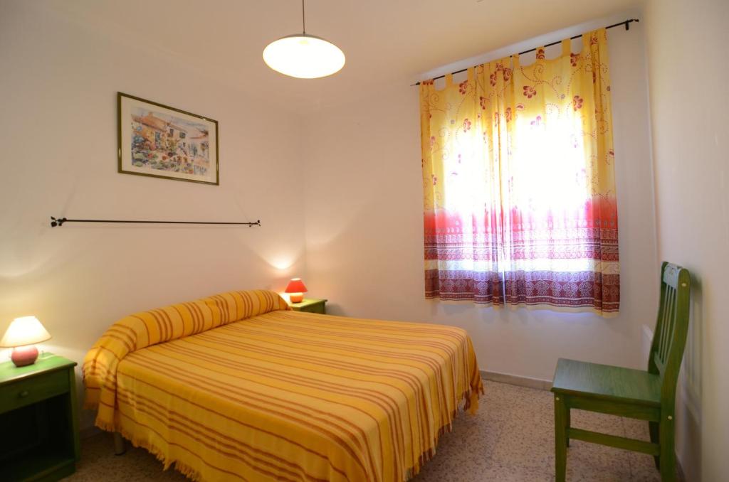 Posteľ alebo postele v izbe v ubytovaní Gregal - apartamentos
