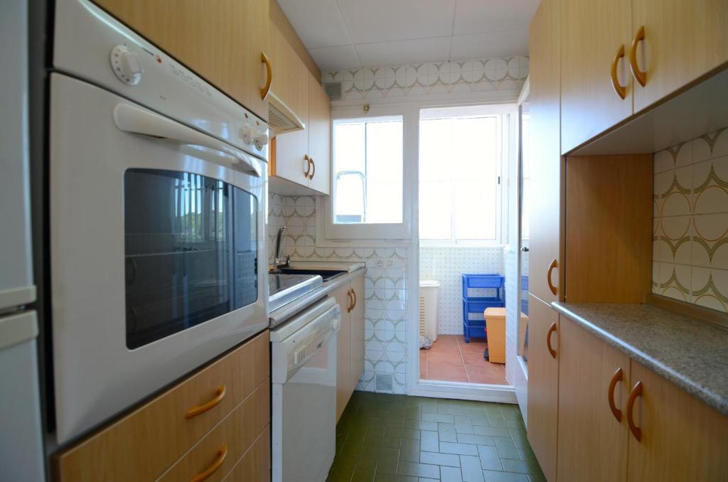 Kuchyňa alebo kuchynka v ubytovaní Gregal - apartamentos