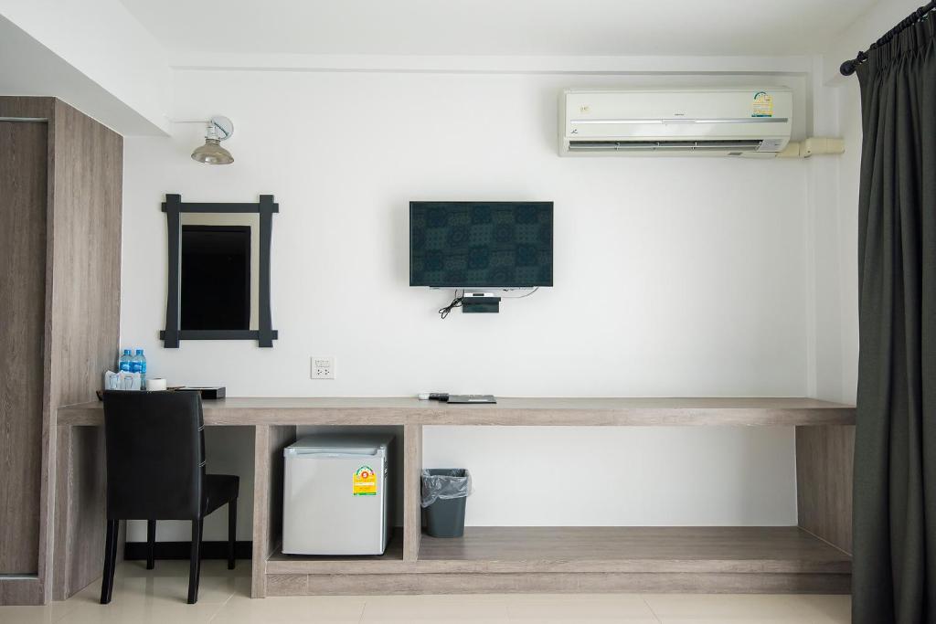 TV a/nebo společenská místnost v ubytování Irin Beach Cha-am