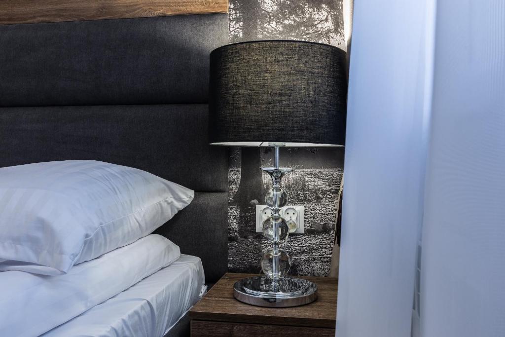 Posteľ alebo postele v izbe v ubytovaní Apartament Helena Odkryj Zakopane