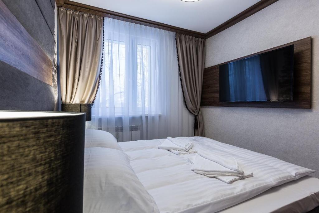 Posteľ alebo postele v izbe v ubytovaní Apartament Helena Odkryj Zakopane