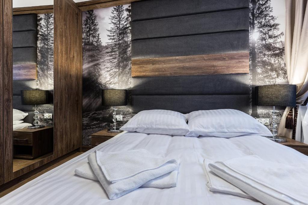Posteľ alebo postele v izbe v ubytovaní Apartament Helena Odkryj Zakopane