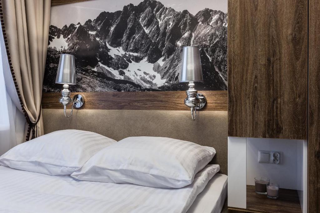 Posteľ alebo postele v izbe v ubytovaní Apartament Helena Odkryj Zakopane