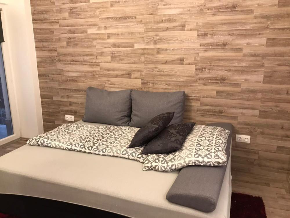 A bed or beds in a room at The Whistling Rabbi