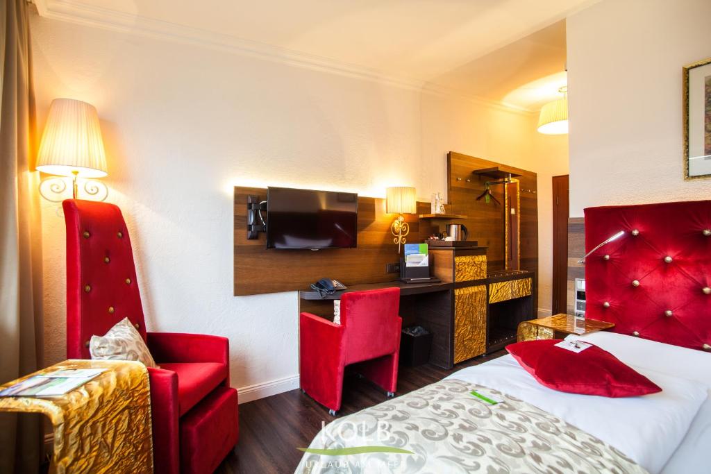 Postel nebo postele na pokoji v ubytování Hotel Kolb