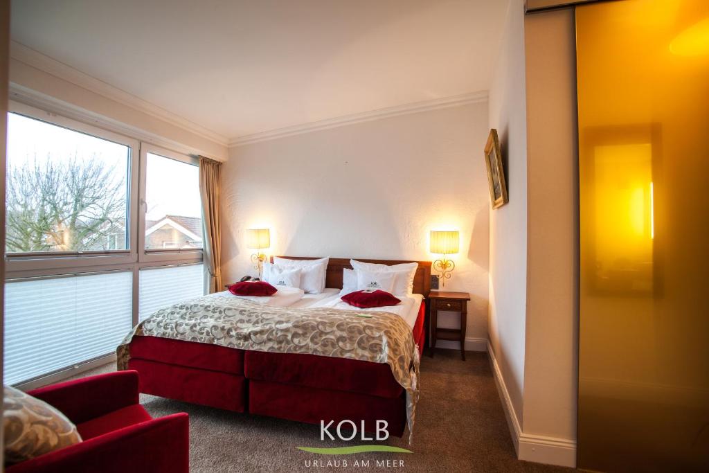 Postel nebo postele na pokoji v ubytování Hotel Kolb