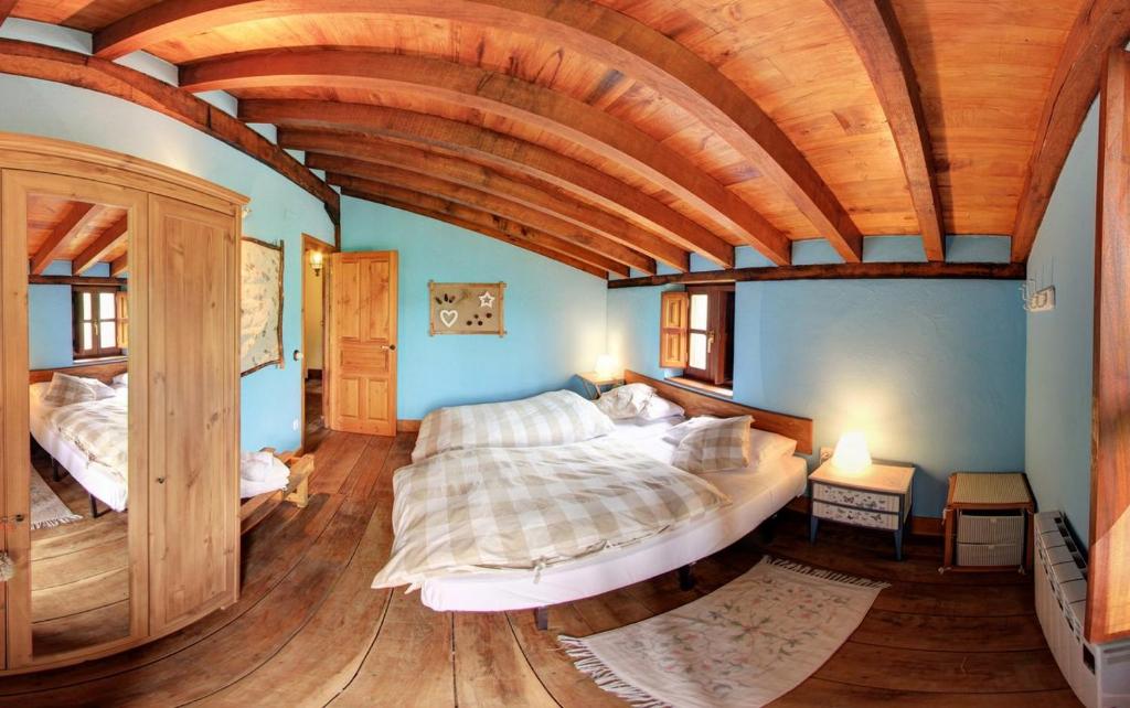 Postel nebo postele na pokoji v ubytování Cabañas con Encanto