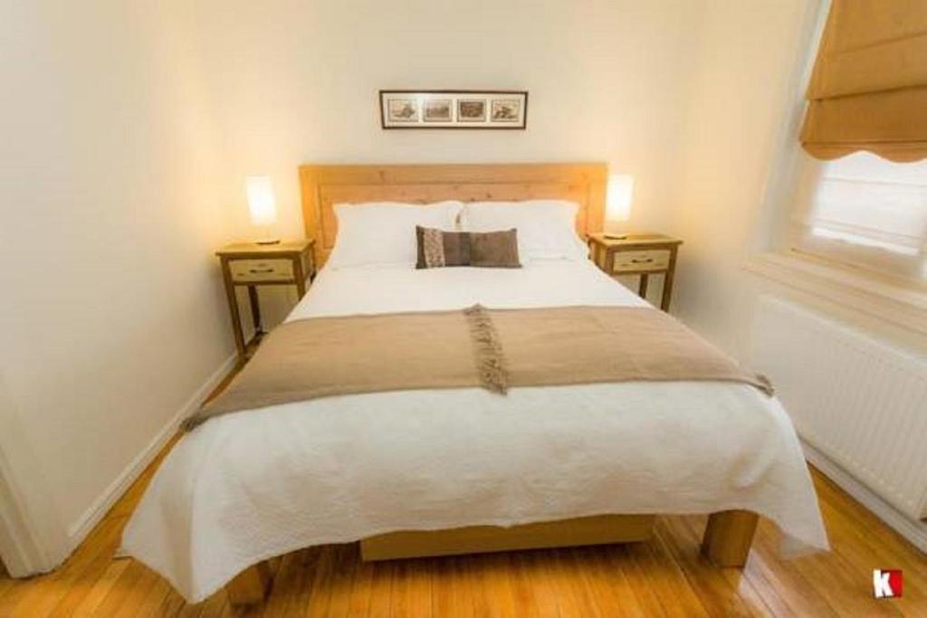 Postel nebo postele na pokoji v ubytování Innata Casa Hostal