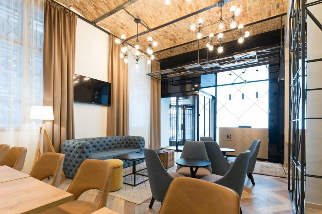 Posezení v ubytování Capital Hotel Garni