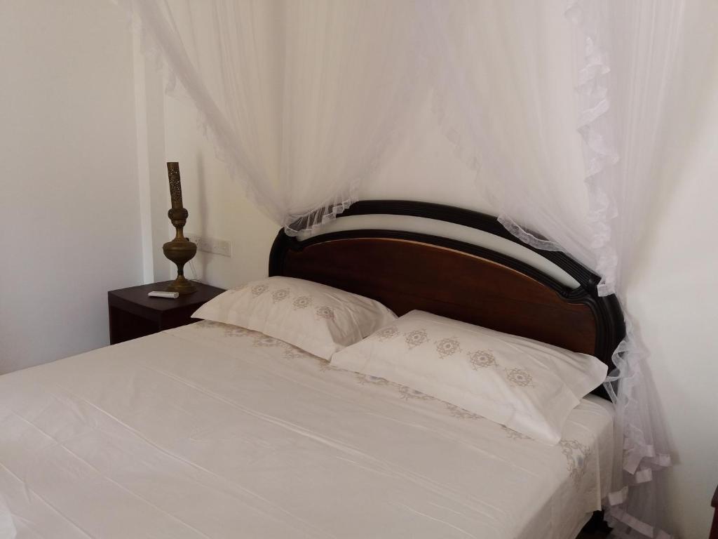 Postel nebo postele na pokoji v ubytování Hotel La Felicita
