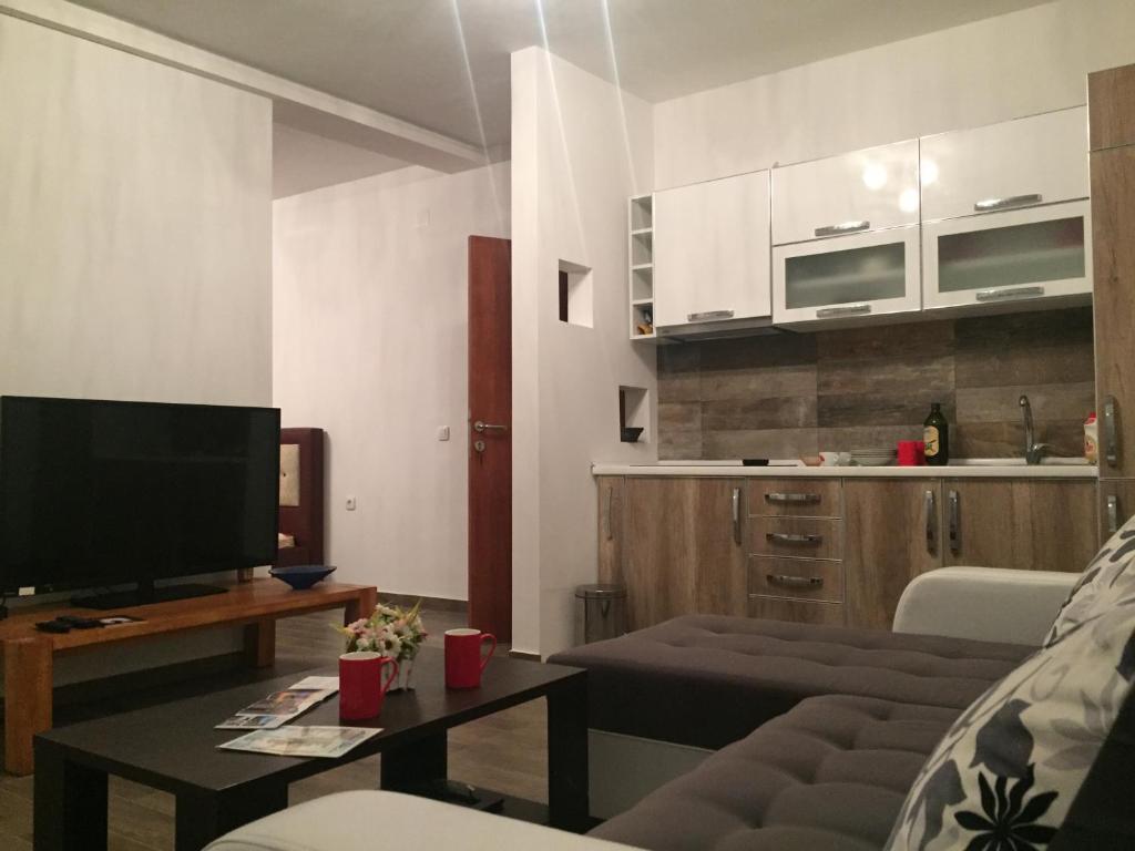 TV a/nebo společenská místnost v ubytování Casa Mila apartments & bungalows