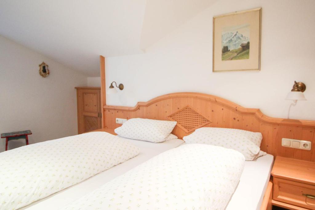 Postel nebo postele na pokoji v ubytování Apartments- und Ferienhaus Anton