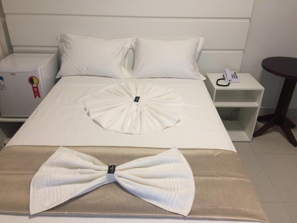 Postel nebo postele na pokoji v ubytování Hotel Portal Guanambi