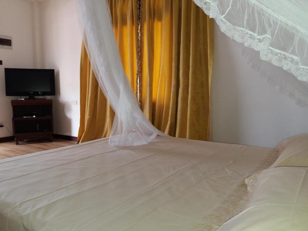 Postel nebo postele na pokoji v ubytování Hotel La Felicita