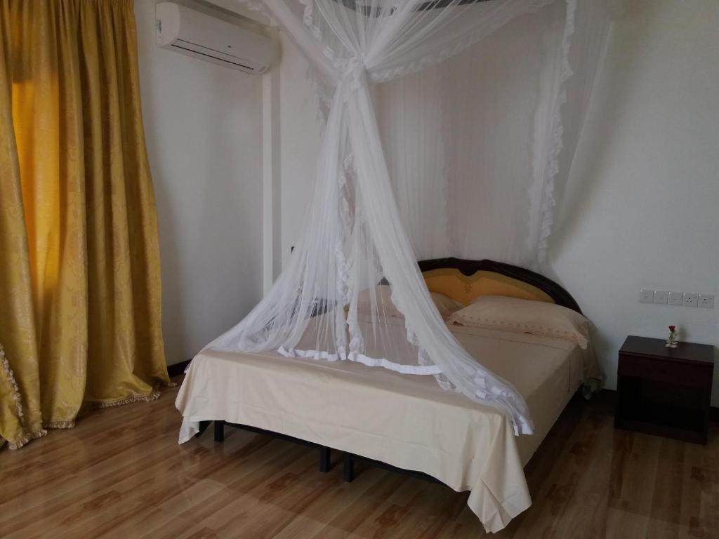 Postel nebo postele na pokoji v ubytování Hotel La Felicita