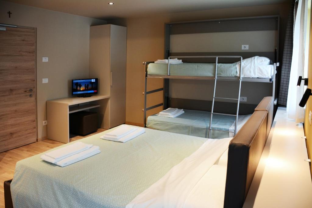 A bed or beds in a room at Casa Baldelli