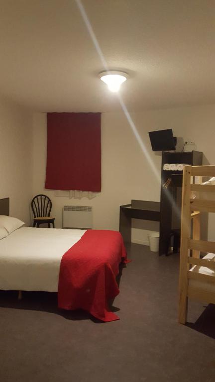 Postel nebo postele na pokoji v ubytování Relax Hotel