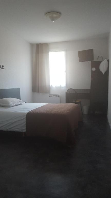 Postel nebo postele na pokoji v ubytování Relax Hotel