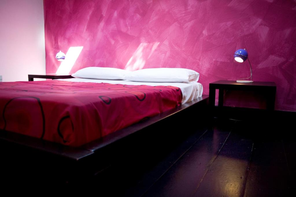 Postel nebo postele na pokoji v ubytování BAD - B&B And Design