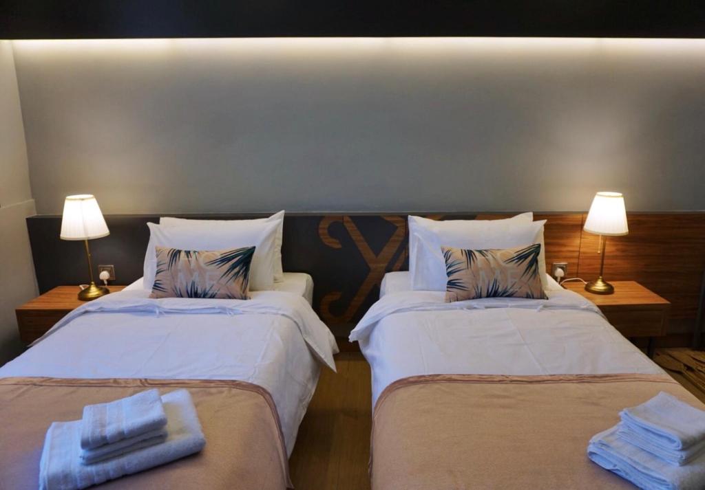 Postel nebo postele na pokoji v ubytování Hotel Gaia 95