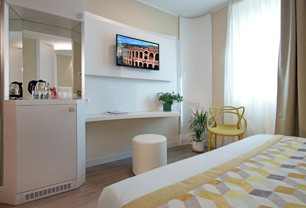 Postel nebo postele na pokoji v ubytování Ark Hotel