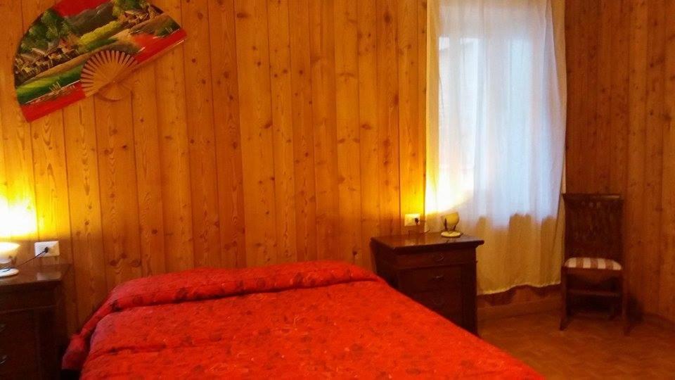 Postel nebo postele na pokoji v ubytování Mondo D'Oro