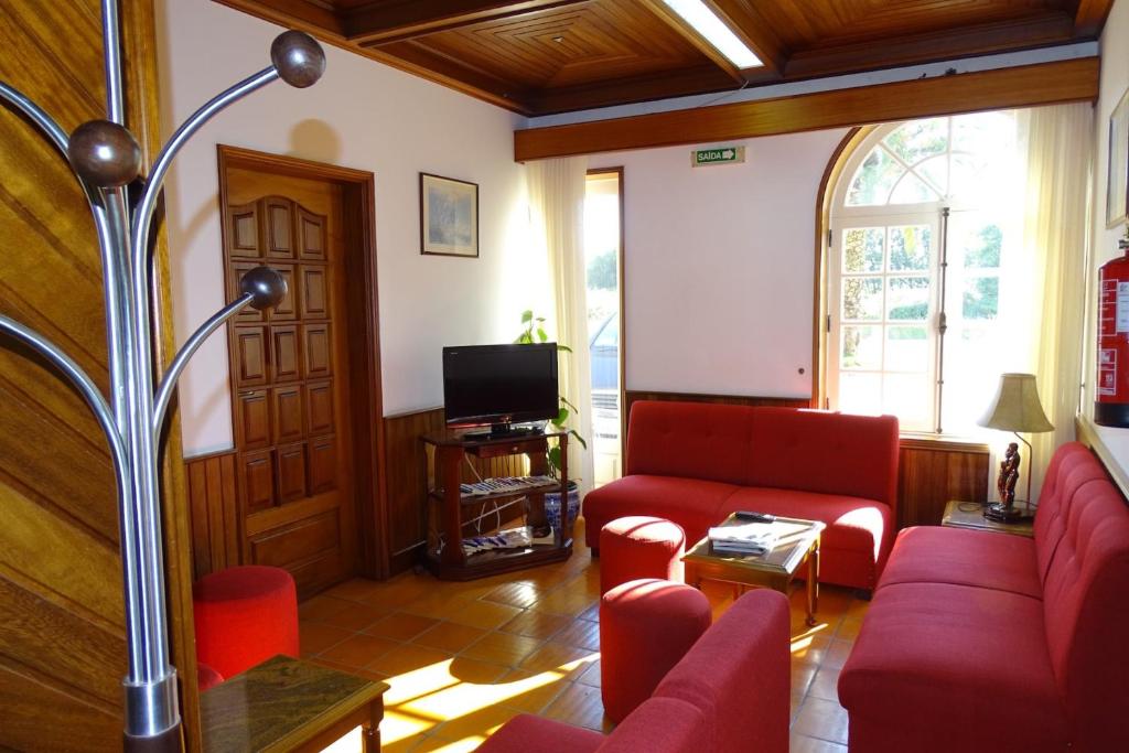 TV a/nebo společenská místnost v ubytování Hotel Mira Rio