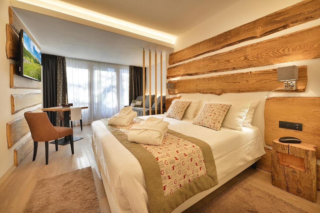 TV a/nebo společenská místnost v ubytování Hotel Bucaneve