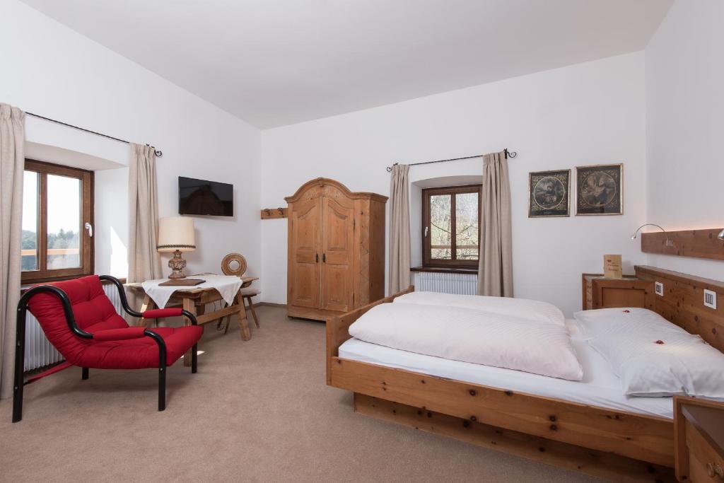 Postel nebo postele na pokoji v ubytování Hotel Ansitz Kematen ***S
