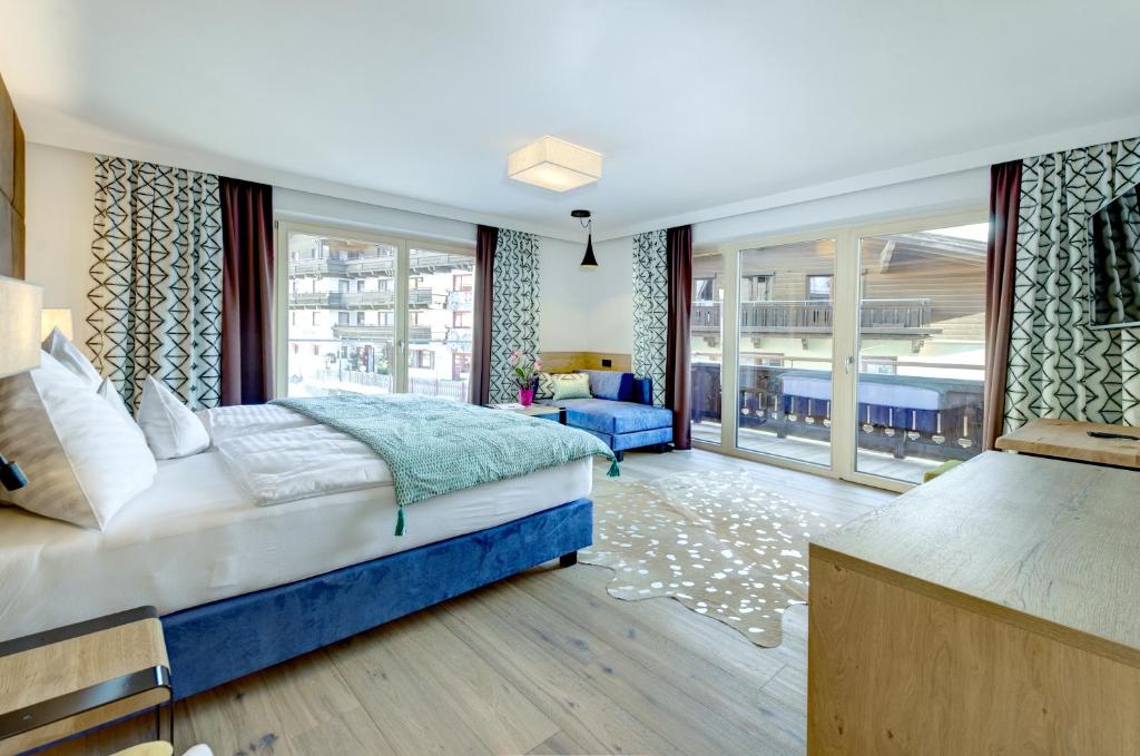 A bed or beds in a room at Hotel Kendler