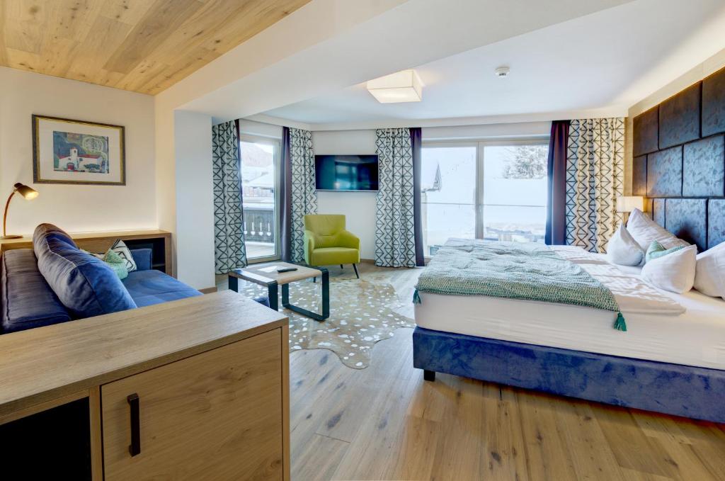 A bed or beds in a room at Hotel Kendler