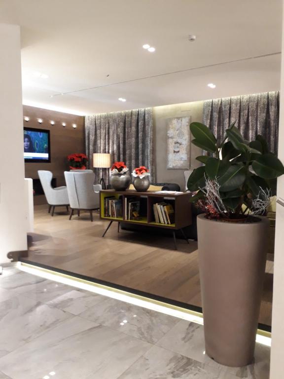 TV a/nebo společenská místnost v ubytování Hotel Soperga