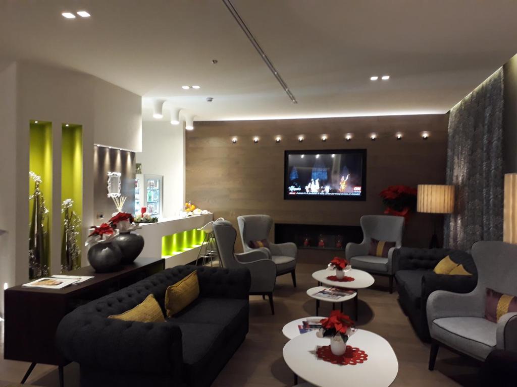 TV a/nebo společenská místnost v ubytování Hotel Soperga