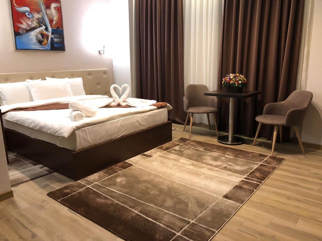 Postel nebo postele na pokoji v ubytování AEN Hotel-Old City