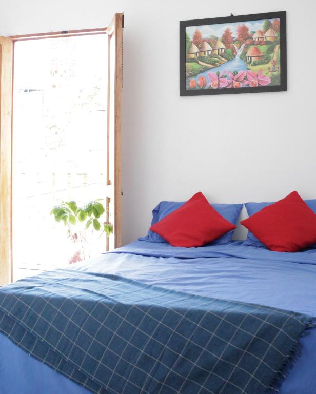 Postel nebo postele na pokoji v ubytování Casa Edith