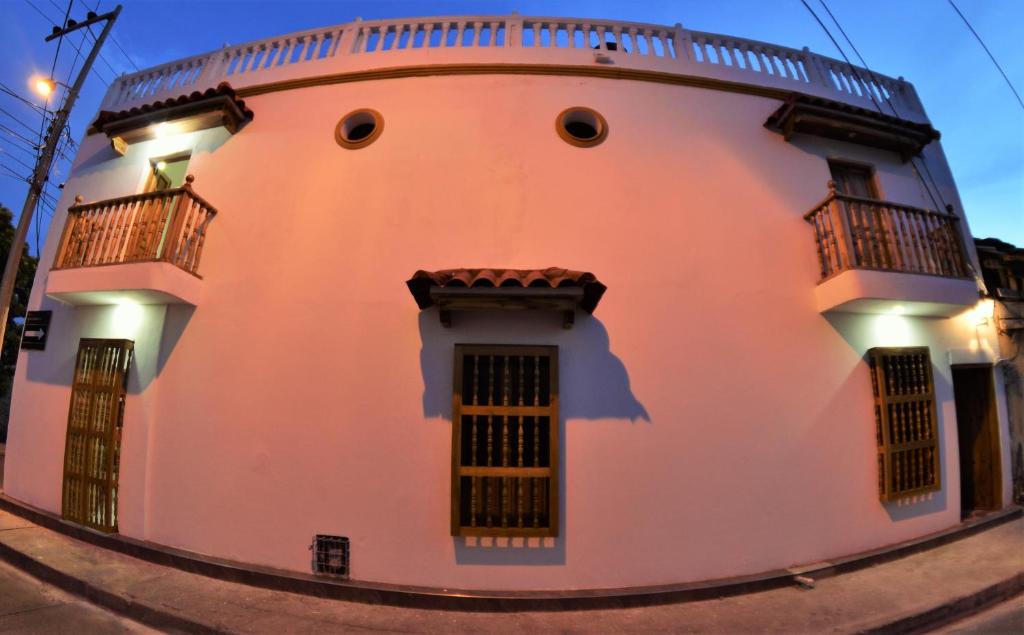 a round building with lights on the side of it at Casa Edith in Cartagena de Indias