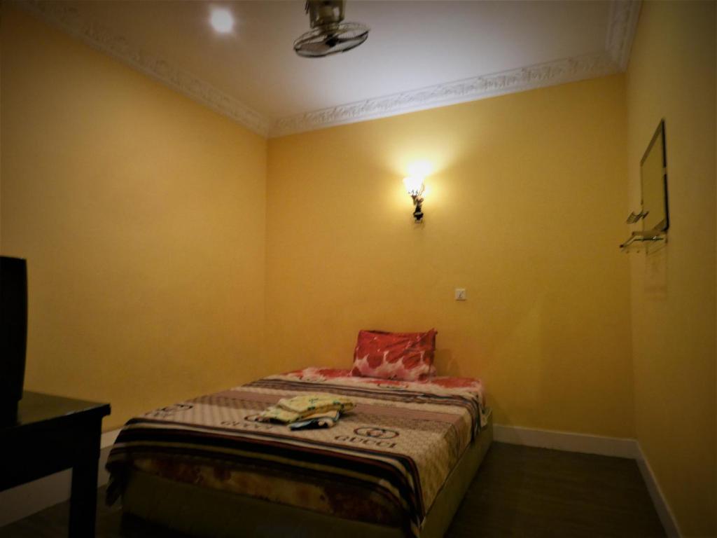 Postel nebo postele na pokoji v ubytování Pich Guesthouse