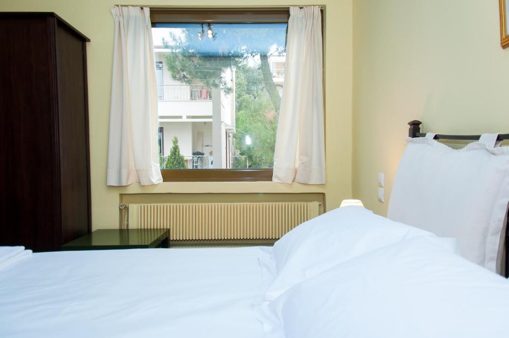 Posteľ alebo postele v izbe v ubytovaní Stephany Apartment