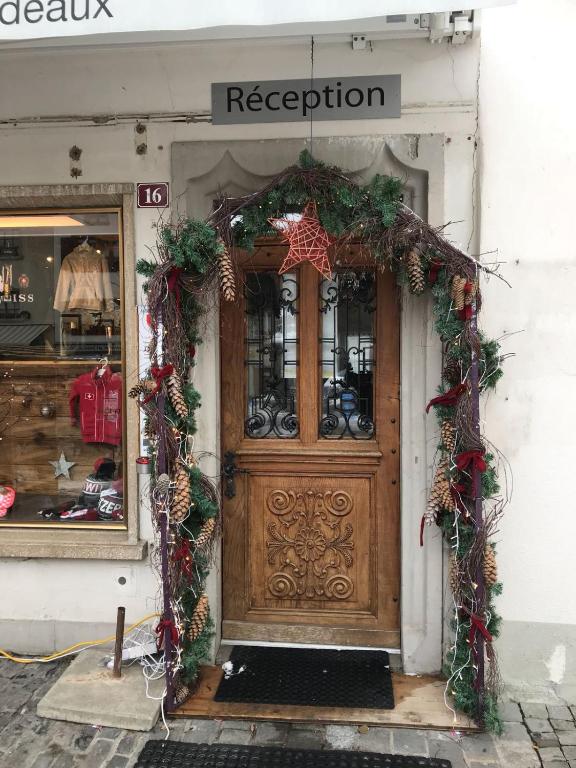 Πιστοποιητικό, βραβείο, πινακίδα ή έγγραφο που προβάλλεται στο Gruyère Rooms