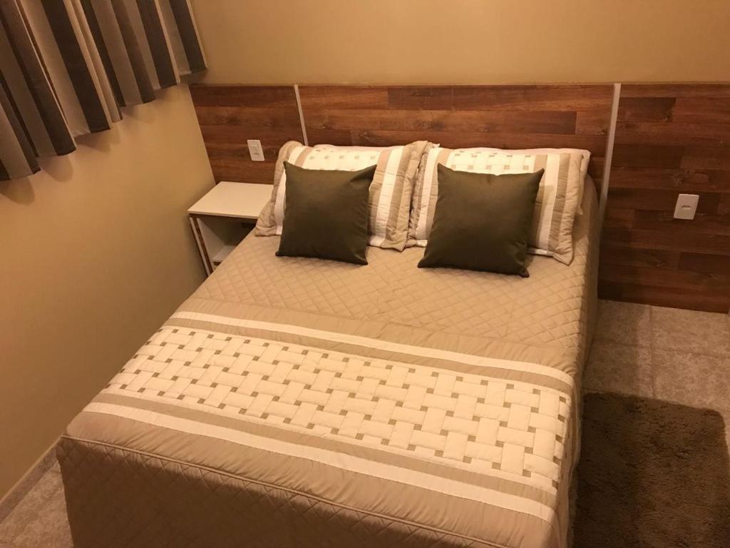 Cama ou camas em um quarto em Amoreiras Hotel Pousada