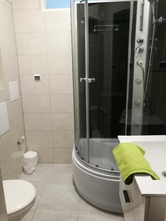 Kúpeľňa v ubytovaní Mikołajki Apartamenty Rynek